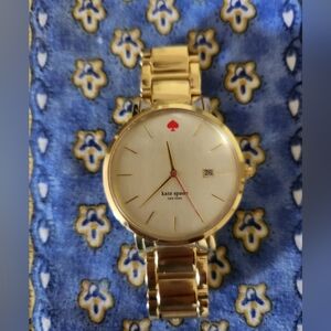 Kate Spade Gold Bracelet Watch with Red Spade Accent At 12 O'clock